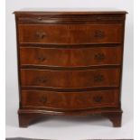 A mahogany serpentine front chest with brushing slide, fitted four drawers on bracket feet,