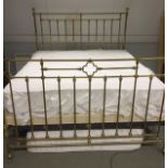 A Victorian brass bedstead with turned finials,