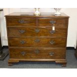 A George III mahogany chest with crossbanded top,