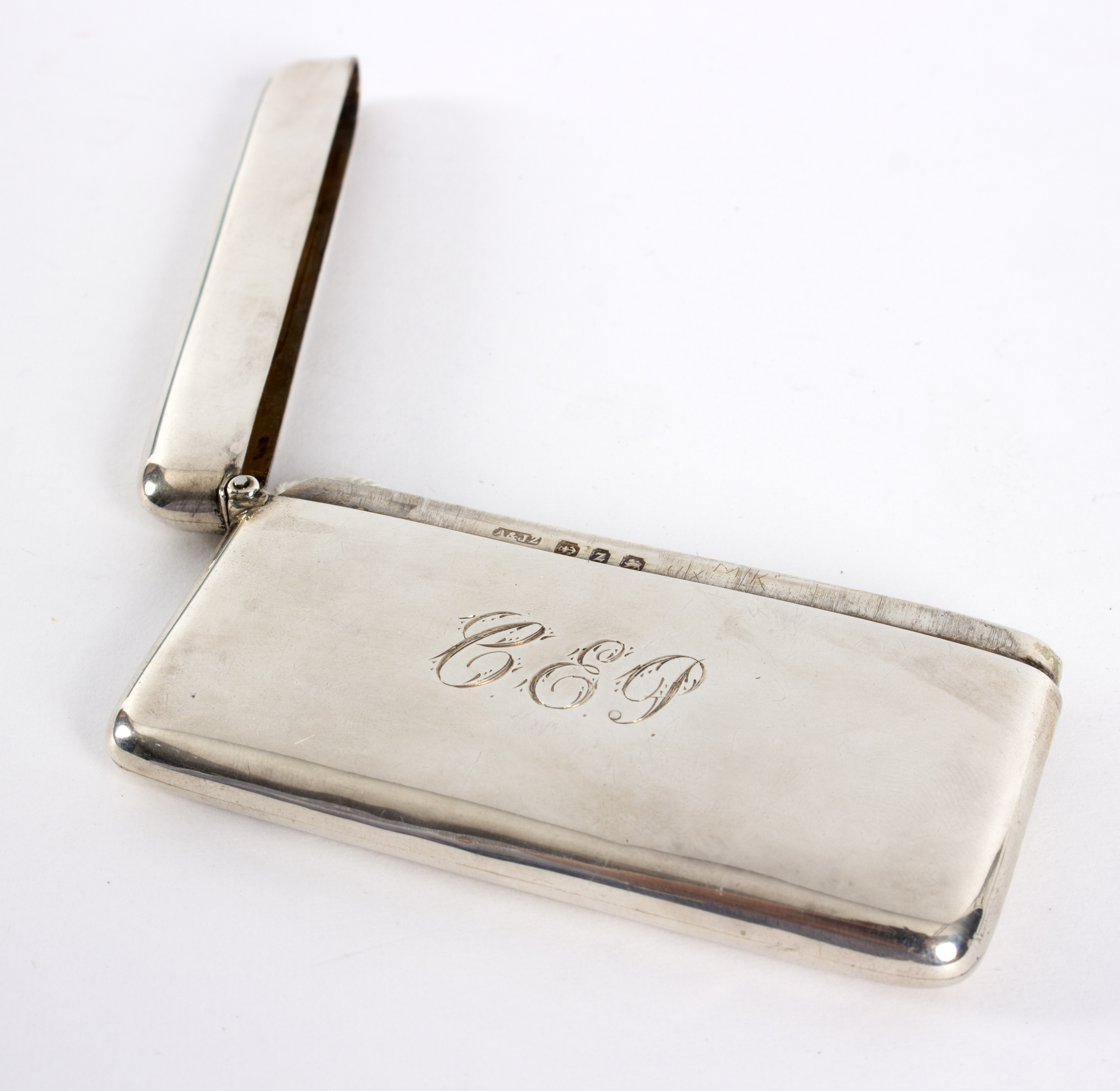 A silver visiting card case, A & J Zimmerman Ltd, Birmingham 1899, of plain rectangular form, 8. - Image 2 of 2