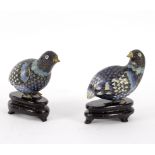 A pair of Chinese Cloisonne figures of quail, 20th Century, decorated in white,