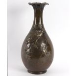 A large Japanese bronze vase of baluster form applied with an eagle on a branch, signed to base,