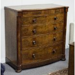 A Victorian mahogany bowfront chest of four long drawers with pillars to the sides,