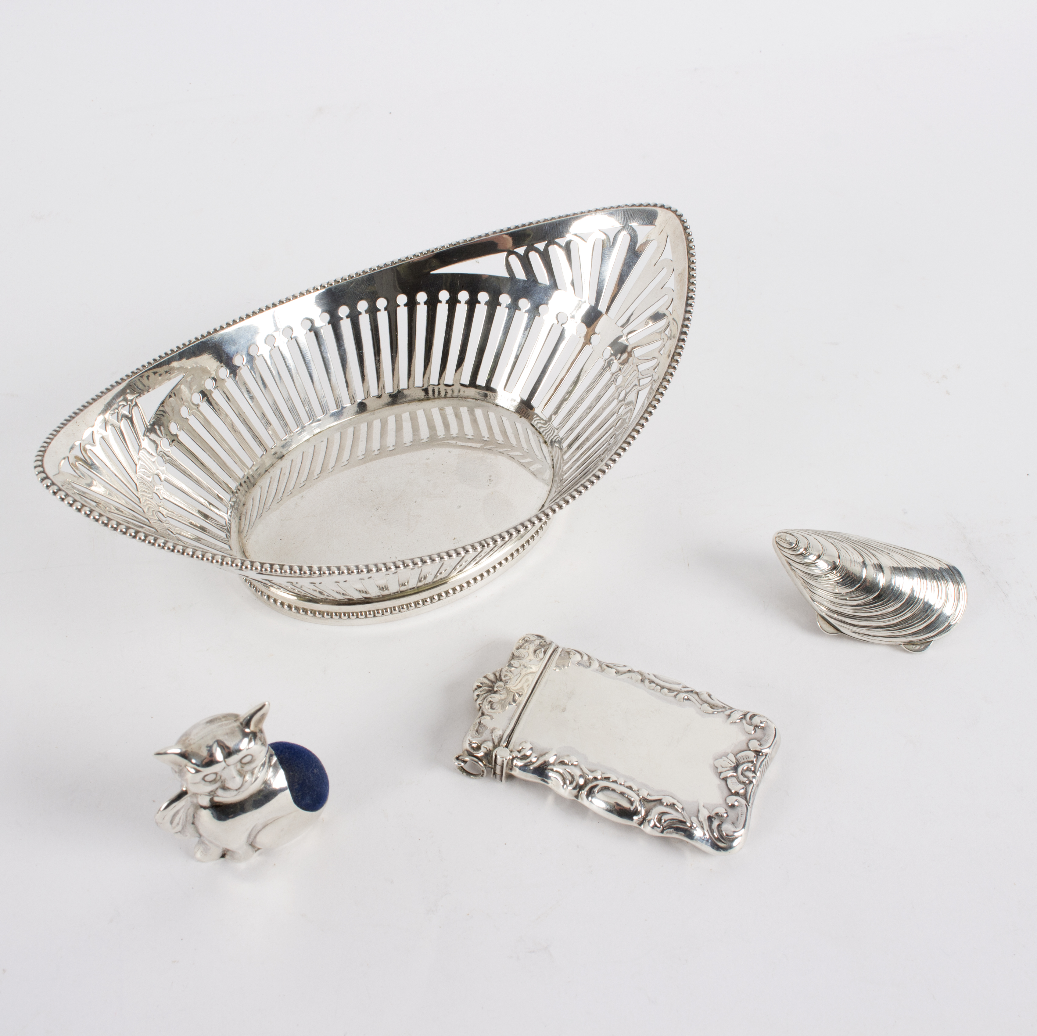 A Dutch silver bowl of navette shape with beaded rim and pierced sides, 18cm long, - Image 2 of 2