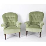 A pair of Edwardian button back armchairs,