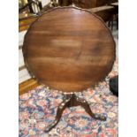 A mahogany table of George III style,