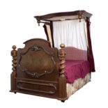 A Victorian mahogany framed half-tester bed,