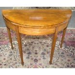 A Regency mahogany half round tea table with boxwood stringing, on square taper legs, 91.