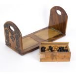 A turned wood chess set and a Victorian walnut book slide