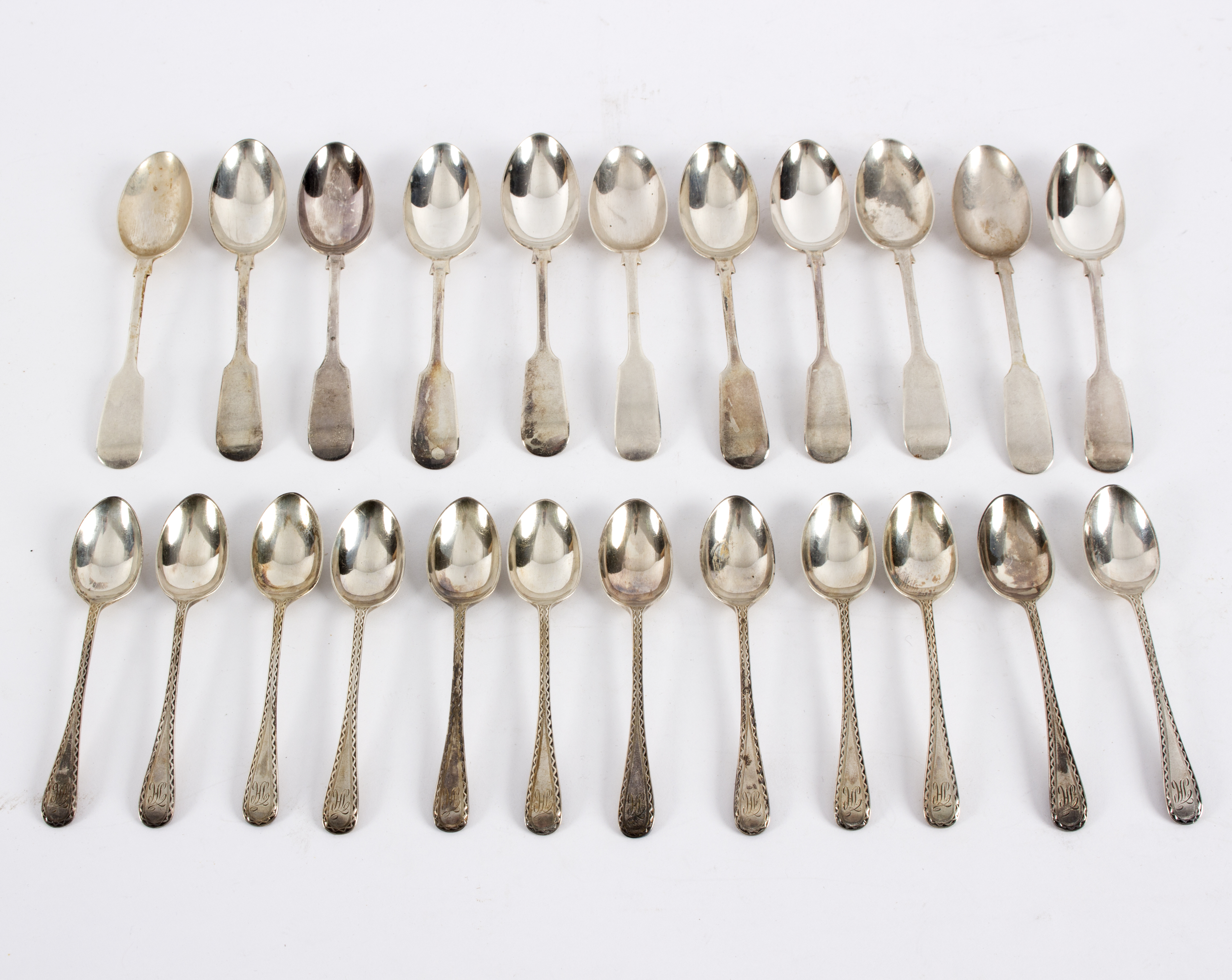 A set of twelve silver coffee spoons, WSS, Sheffield 1908, with bright cut decoration,