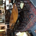 A mahogany two-pillar dining table,