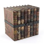 A Huntley & Palmers biscuit tin, Reading and London, modelled as a set of leather bound books,