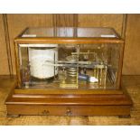 An early 19th Century barograph, A & NCS Ltd, Westminster, with clock mechanism in a brass drum,