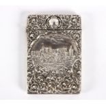 An embossed silver castle top visiting card case, Crisford & Norris Ltd, Birmingham 1906,