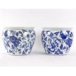 A pair of Chinese blue and white jardinieres, 20th Century, decorated foliage, 24.