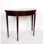 An early 19th Century mahogany tea table,