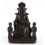 A bronze figure of Guanyin with attendants,