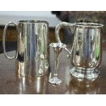 Two silver tankards, approximately 740gm and a small vase,