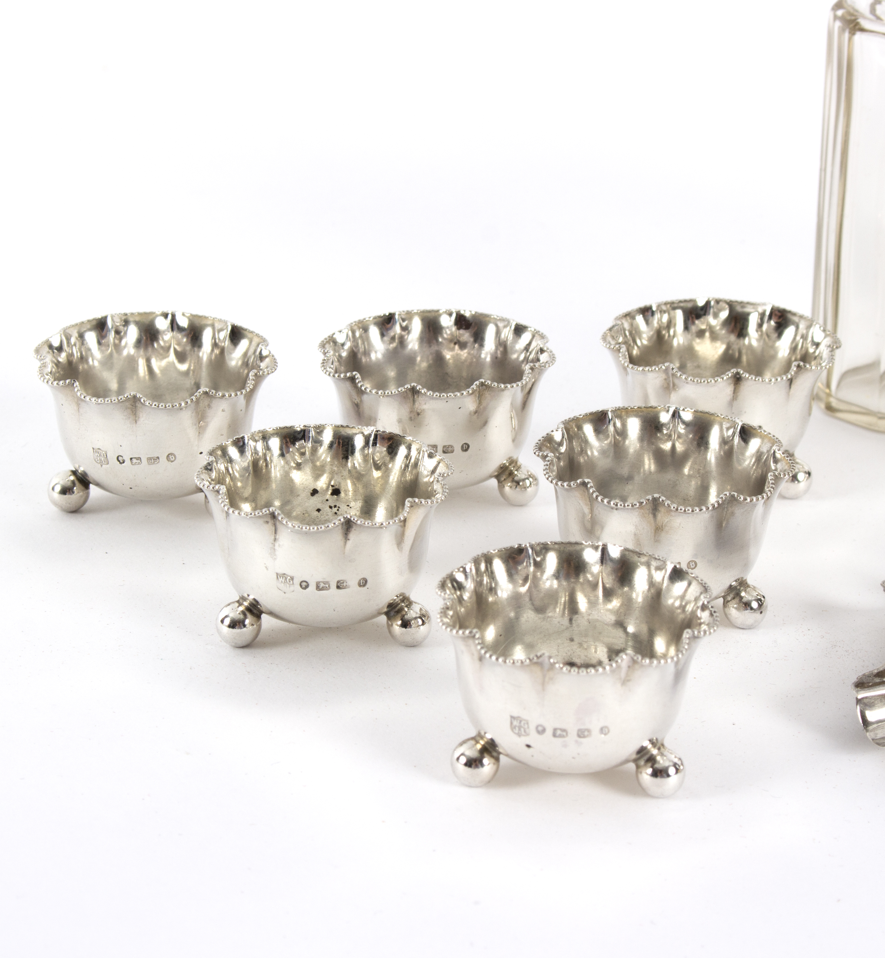 A set of six silver small open salts, Birmingham 1882, with wavy rims on ball feet, - Image 2 of 2