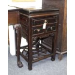 A Chinese jardiniere stand, fitted drawers with lattice stretcher beneath,