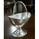 A Georgian silver swing-handled pedestal bowl, Henry John Lias, London 1873,