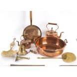 A group of copper and brass wares to include chestnut roasters