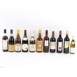 Twelve assorted bottles of wine and spirit to include a 1985 Chinon