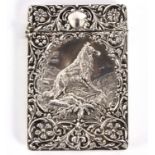 An embossed silver visiting card case, Crisford & Norris Ltd, Birmingham 1908,