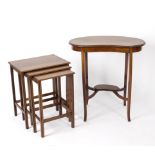 A nest of three mahogany tables with crossbanding, on square legs,