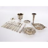 A small group of silver to include two pierced bonbon dishes, an ashtray, a spill vase,