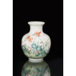 A Chinese porcelain baluster vase, Republic circa 1925, enamelled with flowering branches,