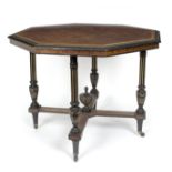 An Edwardian octagonal table, with amboyna crossbanded top with ebonised border,