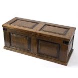 A late 18th Century oak chest with hinged cover,