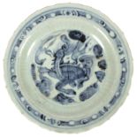 An early 16th Century Chinese blue and white plate, centred by a mythical beast, 22.