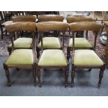 Six Regency mahogany dining chairs with concave top rails,