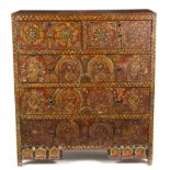 Attributed to the Omega workshops, a painted chest of two short over three long drawers,