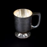 A silver mug, Central School of Arts & Crafts, London 1940, with planished surface,