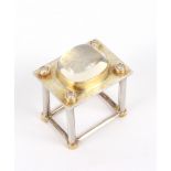 Barbara Christie, a silver, diamond and moonstone 'table' ring,