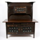 Manner of Leonard Wyburd for Liberty & Co, an oak Arts & Crafts sideboard,