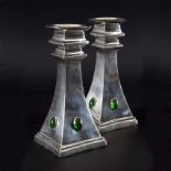 Liberty & Co, a pair of silver plated candlesticks,