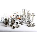 A quantity of Robert Welch Old Hall stainless steel wares, to include tea services, condiment sets,