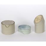 Stephen Jones (British, 20th Century), three porcelain boxes and covers of asymmetric form,