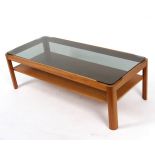 Myer, a smoked glass topped coffee table on teak base,