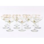 A set of eleven Babycham glasses