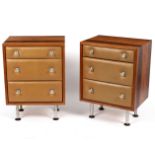 A pair of rosewood bedside cabinets, each fitted three drawers with vinyl fronts,