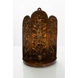 John Pearson, a copper embossed wall sconce, decorated with birds and foliage,