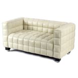 After Josef Hoffmann, Kubus, a modern two-seater sofa button upholstered in white leather,