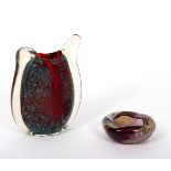 A studio glass vase in the Murano style with red mottled interior and an ashtray