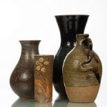 A group of four studio pots comprising a large waisted vase, incised 7 beneath, 36.