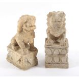 A Chinese carved alabaster dog of Fo and a similar stone example